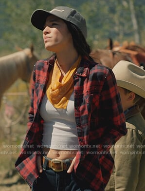 Monica's red studded plaid shirt on Yellowstone