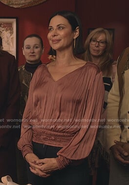 Cassie's pink v-neck pleated top on Good Witch