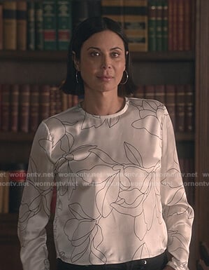 Cassie's white floral satin top on Good Witch