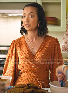 Joyce's orange leopard wrap top on Never Have I Ever