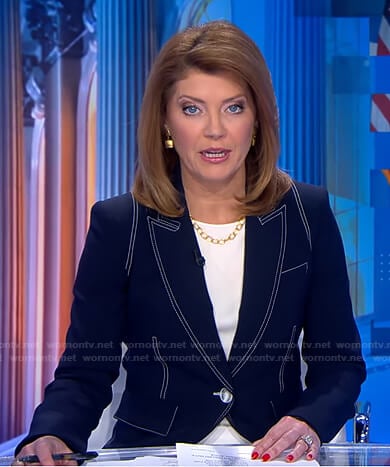 Norah's navy blazer with white stitching on CBS Evening News