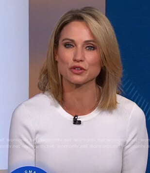 Amy's white ribbed shoulder top and purple pants on Good Morning America