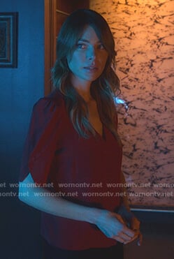 Chloe's red v-neck button front top on Lucifer