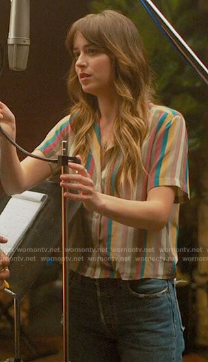 Maggie's multi colored striped shirt on The High Note