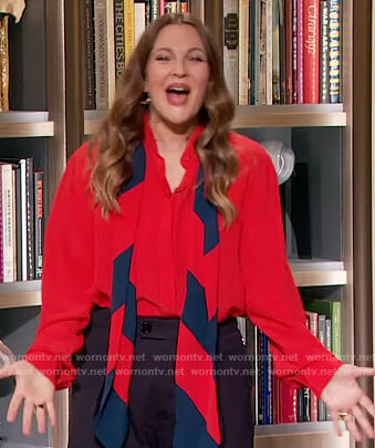 Drew's red contrast tie neck blouse on The Drew Barrymore Show