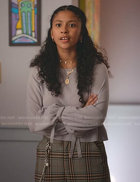 Julie's lilac tie cuff sweater and grey plaid pants on Julie and the Phantoms