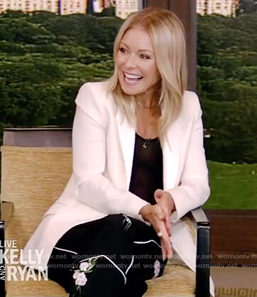 Kelly's black floral piping trim pants on Live with Kelly and Ryan