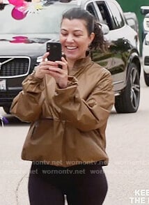 Kourtney's brown windbreaker jacket on Keeping Up with the Kardashians