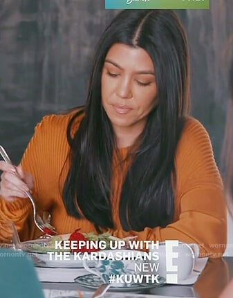 Kourtney's orange ribbed sweater on Keeping Up with the Kardashians