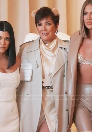 Kris's satin dress and beige trench coat on Keeping Up with the Kardashians