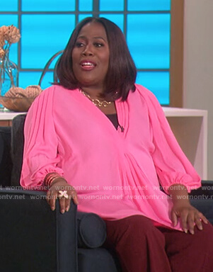 Sheryl's pink pleated top on The Talk