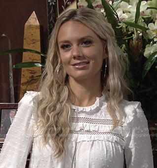 Abby's white swiss dot ruffle blouse on The Young and the Restless