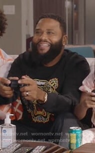 Andre's black tiger embroidered sweatshirt on Black-ish