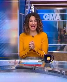 Cecilia's orange ribbed button-cuff sweater on Good Morning America