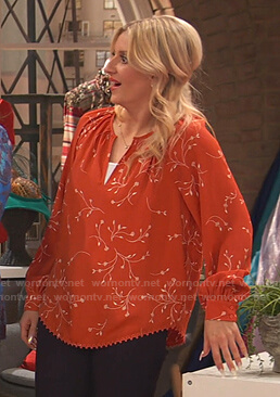Chelsea's orange floral blouse on Ravens Home