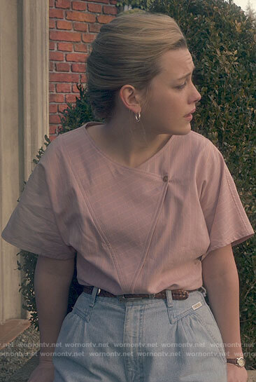 Dani's pink striped asymmetrical top and pleated jeans on The Haunting of Bly Manor