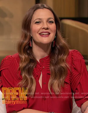 Drew's red ruffle blouse on The Drew Barrymore Show