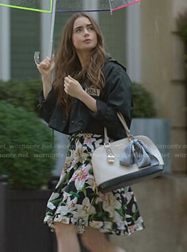 Emily's black jacket and floral print off-shoulder dress on Emily in Paris
