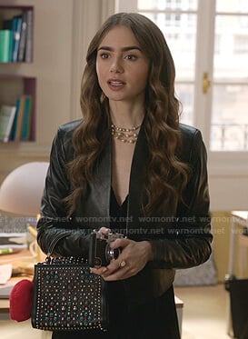 Emily's black leather open jacket on Emily in Paris