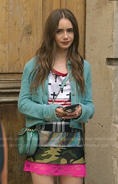 Emily's blue chain trim cardigan on Emily in Paris