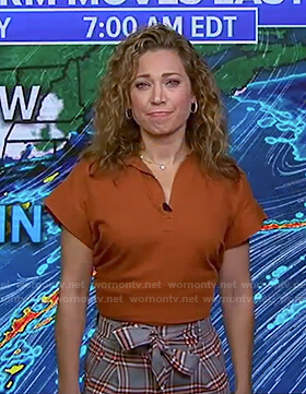 Ginger's orange top and grey check pants on Good Morning America