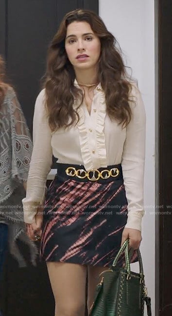 Ginger's tie die mini skirt and white ruffled blouse on Filthy Rich