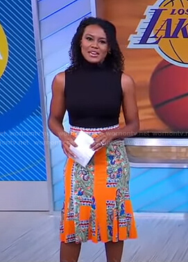 Janai's orange printed skirt on Good Morning America