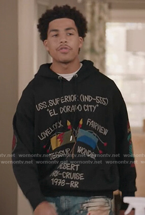 Junior's black El Dorado sweater on Black-ish