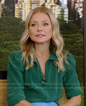 Kelly's green blouse and blue pleated skirt on Live with Kelly and Ryan