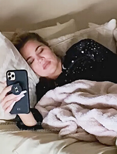 Khloe's black star print pajamas on Keeping Up with the Kardashians