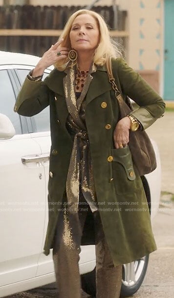 Margaret's green suede trench coat and sequin suit on Filthy Rich