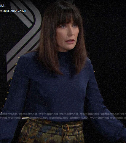 Quinn's blue studded blouse and camo print skirt on The Bold and the Beautiful