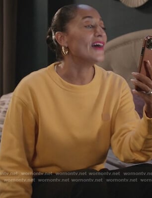Rainbow's yellow face sweatshirt on Black-ish