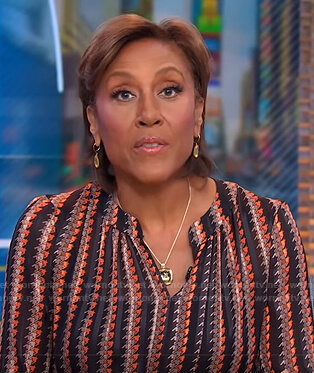 Robin's houndstooth split-neck dress on Good Morning America