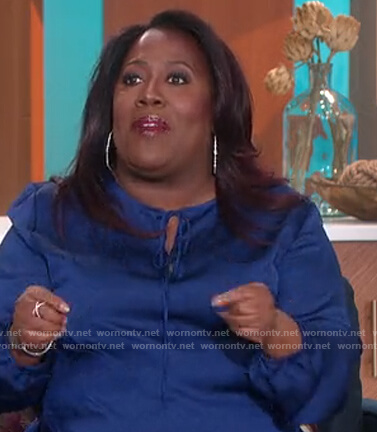 Sheryl's blue satin keyhole blouse on The Talk