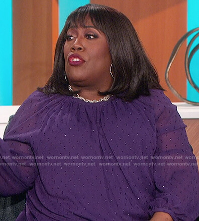 Sheryl's purple sheer top on The Talk