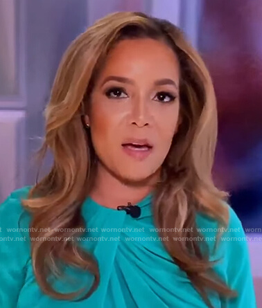 Sunny's turquoise twist neck blouse on The View