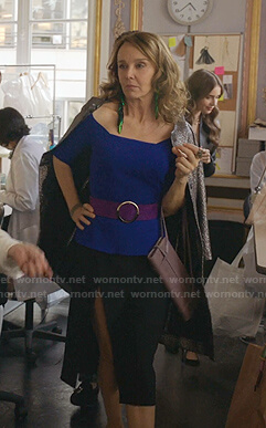 Sylvie's blue off-shoulder top on Emily in Paris