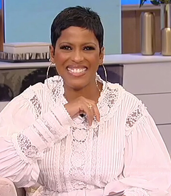 Tamron's white lace blouse on Tamron Hall Show
