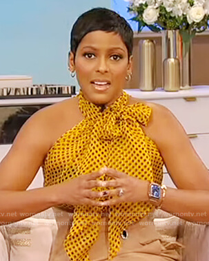 Tamron's yellow polka dot top on Tamron Hall Show
