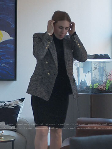 Annie's houndstooth blazer with gold buttons on The Flight Attendant