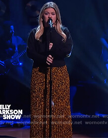 Kelly's black button sweater and floral skirt on The Kelly Clarkson Show