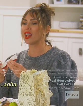 Kelly's gray puff sleeve sweater on The Real Housewives of Orange County
