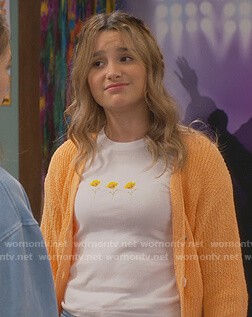 Lex's orange cardigan and floral tee on Side Hustle
