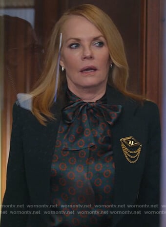 Lisa's green floral tie neck blouse on All Rise