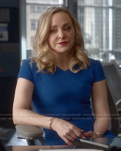 Marissa's blue v-neck dress on Bull