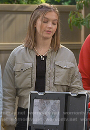 Presley's khaki bomber jacket on Side Hustle