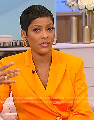 Tamron's orange double breasted blazer on Tamron Hall Show
