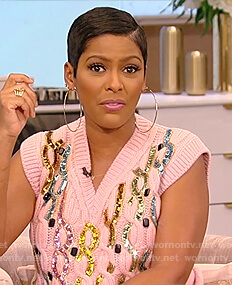 Tamron's pink sequin embellished sweater vest on Tamron Hall Show
