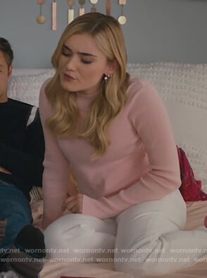 Taylor's pink ribbed mock neck sweater on American Housewife